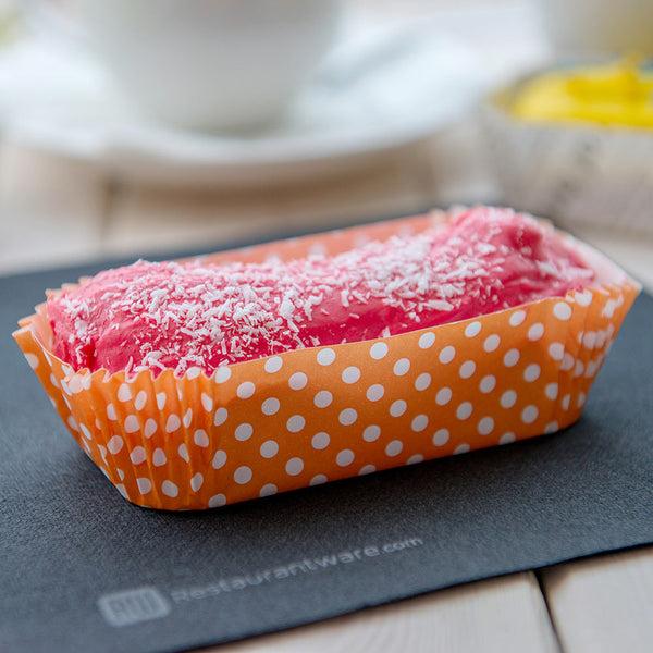 Restaurantware Panificio 5 Oz Elliptical Polka-Dotted Hot Orange Paper Large Baking Cup - Ridged - 4 1/2" X 2 1/2" X 1 1/4" - 200 Count Box