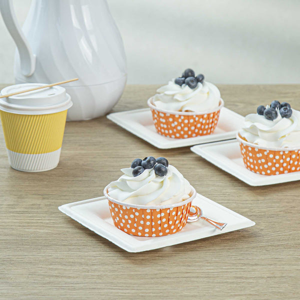 Restaurantware Panificio 5 Oz Round Polka-Dotted Hot Orange Paper Large Baking Cup - Pleated - 3 3/4" X 3 3/4" X 1 1/2" - 200 Count Box