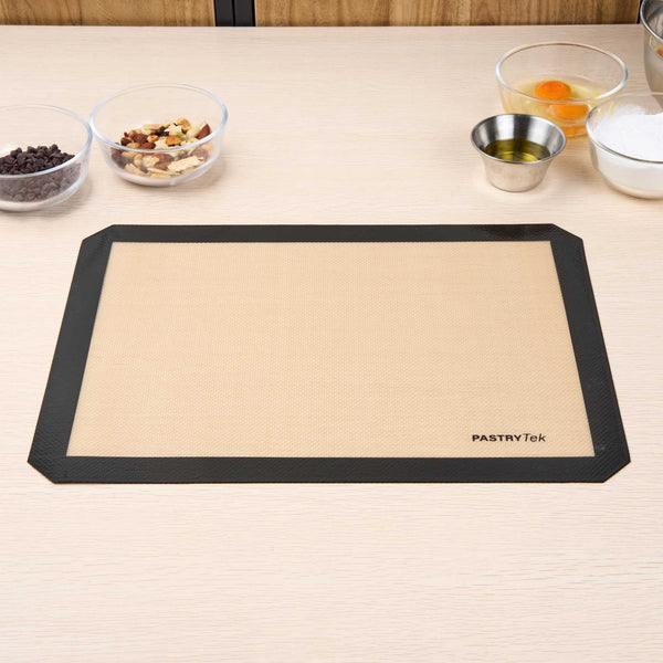 Restaurantware Pastry Tek Rectangle Tan And Black Silicone Half Size Baking Mat - Ultra Durable - 11 3/4" X 15 3/4" - 1 Count Box