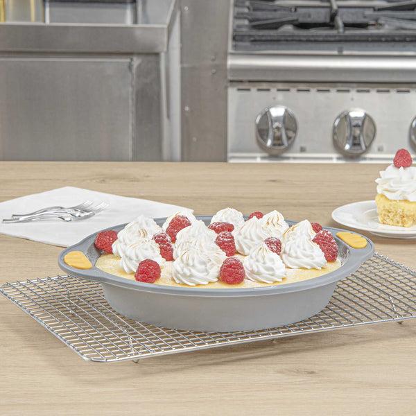 Restaurantware Pastry Tek Round Gray Silicone Cake Pan - Non-Stick With Handles - 11 1/4" X 10 1/4" X 1 3/4" - 10 Count Box