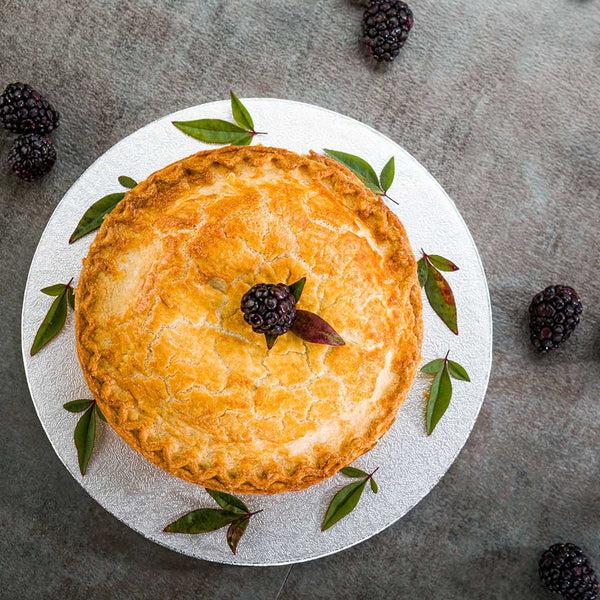 Restaurantware Pastry Tek Round Metallic Silver Cardboard Cake Drum Board - Covered Edge - 8" X 8" X 1/2" - 1 Count Box