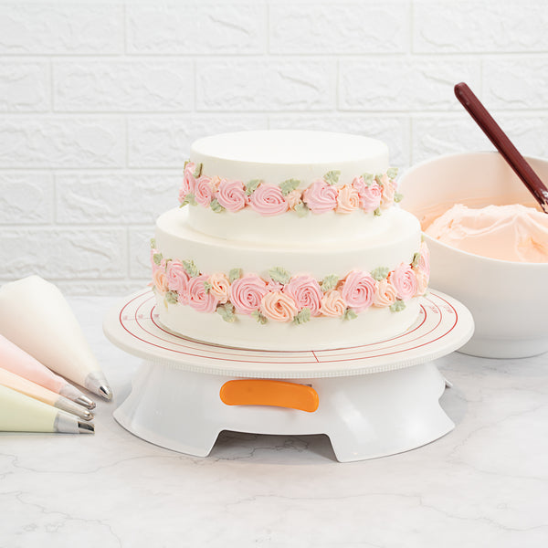 Restaurantware Pastry Tek Round White Plastic Revolving Cake Stand / Turntable - Non-Slip Base - 12" - 1 Count Box