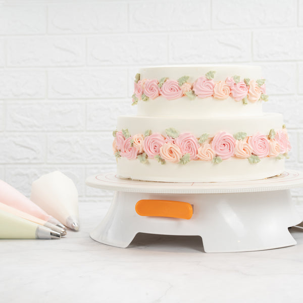 Restaurantware Pastry Tek Round White Plastic Revolving Cake Stand / Turntable - With Non-Slip Base Silicone Piping Bag Set - 12" - 1 Count Box