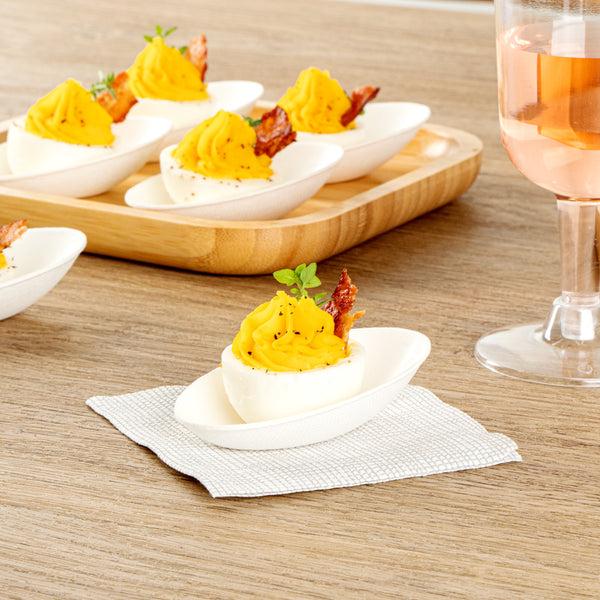 Restaurantware Pulp Safe No PFAS Added White Sugarcane / Bagasse Egg-Shaped Tasting Dish - Home Compostable - 3 1/4" X 2" X 1" - 100 Count Box