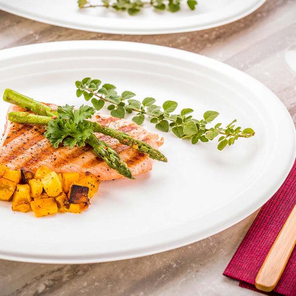 Restaurantware Pulp Tek Oval White Sugarcane / Bagasse Large Plate - 12 1/2" X 10" X 1" - 100 Count Box