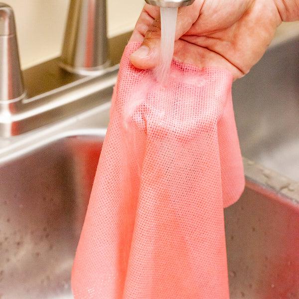 Restaurantware RW Clean Red Viscose Heavy Duty Wipe Roll - 11" X 11" - 50 Sheets X 10 Rolls