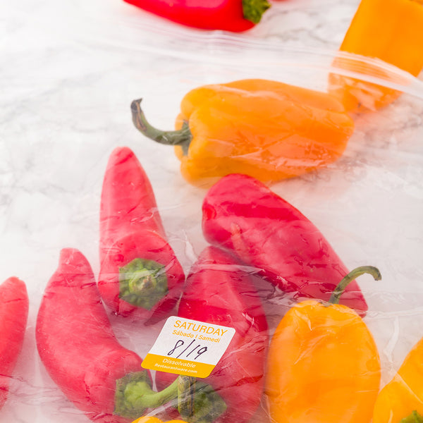 Restaurantware RW Smart Orange Paper Weekly Saturday Food Rotation Label - Dissolvable Trilingual - 1" X 1" - 500 Count Roll