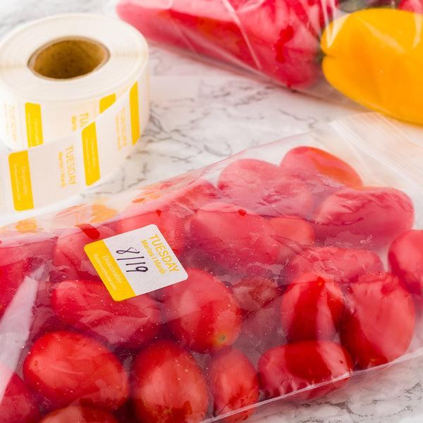 Restaurantware RW Smart Yellow Paper Weekly Tuesday Food Rotation Label - Dissolvable Trilingual - 1" X 1" - 500 Count Roll