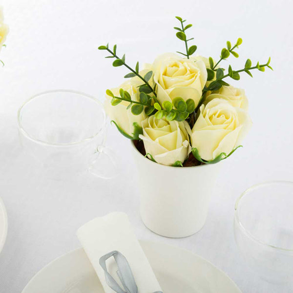 Restaurantware Sapone Del Fiore Round Yellow Plastic Roses In Porcelain Pot - 7 Blooms - 4" X 4" X 6" - 12 Count Box