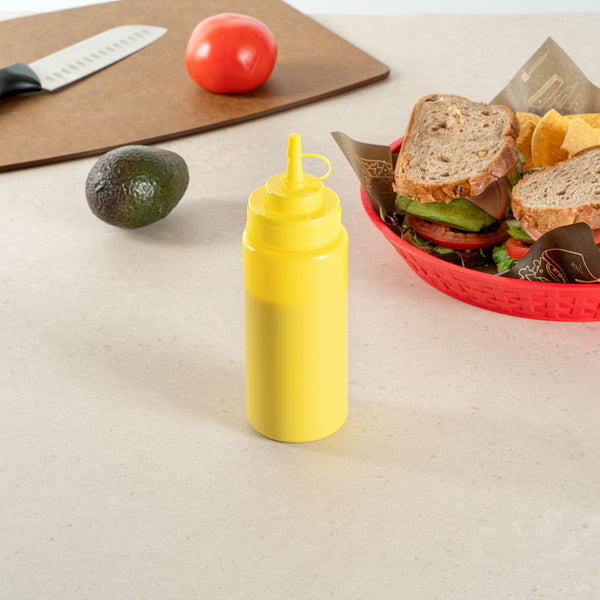 Restaurantware Sauce Tek 16 Oz Yellow Plastic Squeeze Bottle - With Cap Wide Mouth - 2 1/2" X 2 1/2" X 7 3/4" - 1 Count Box