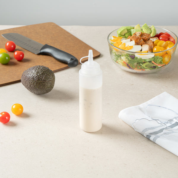 Restaurantware Sauce Tek 8 Oz Clear Plastic Squeeze Bottle - With Cap Wide Mouth - 2" X 2" X 7 1/4" - 1 Count Box