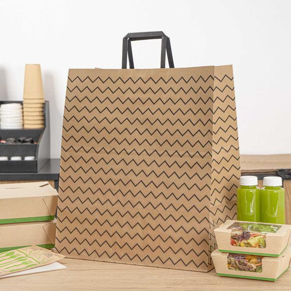 Restaurantware Saving Nature Kraft Paper Large Retail Bag - Black Zig Zag With Handles - 16" X 9 3/4" X 17 1/4" - 100 Count Box