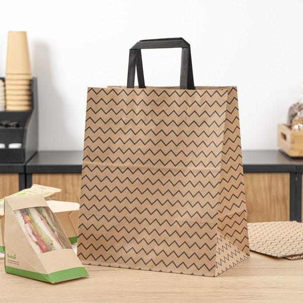 Restaurantware Saving Nature Kraft Paper Medium Retail Bag - Black Zig Zag With Handles - 10" X 6 3/4" X 12" - 100 Count Box