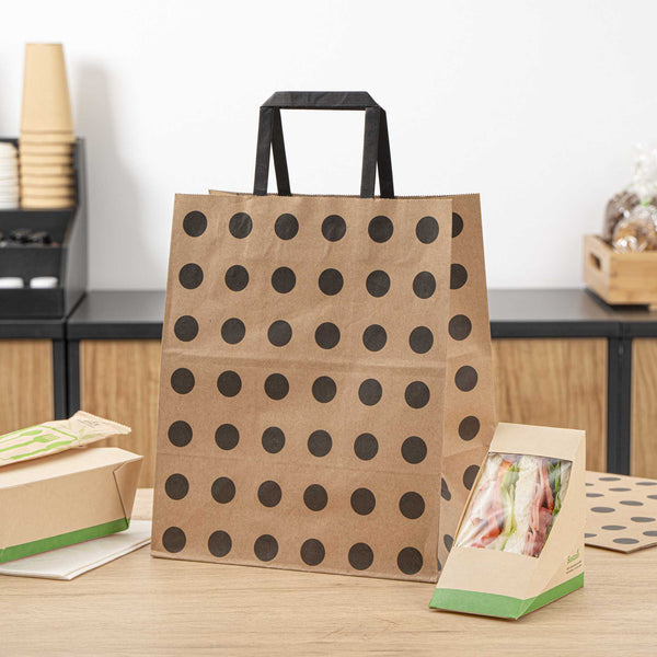 Restaurantware Saving Nature Kraft Paper Medium Retail Bag - Black Polka Dot With Handles - 10" X 6 3/4" X 12" - 100 Count Box