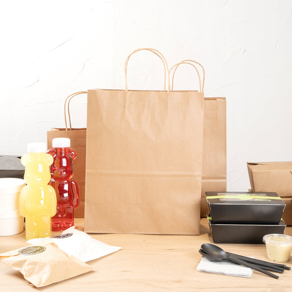 Restaurantware Saving Nature Kraft Paper Retail Bag - With Handles - 10 1/4" X 5 1/2" X 12 1/2" - 100 Count Box