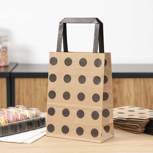 Restaurantware Saving Nature Kraft Paper Small Retail Bag - Black Polka Dot With Handles - 6" X 3 1/4" X 8 1/4" - 100 Count Box