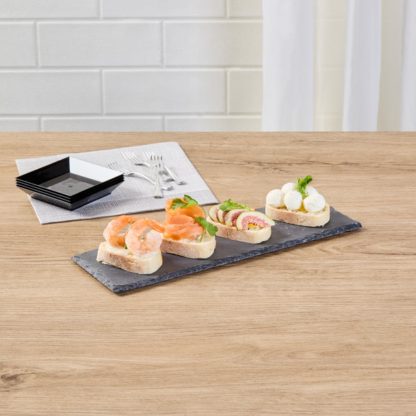 Restaurantware Stone Tek Rectangle Black Slate Serving Tray - 11 3/4" X 4" - 4 Count Box
