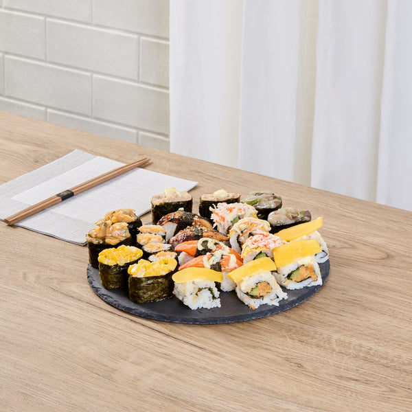 Restaurantware Stone Tek Round Black Slate Serving Plate - 9 3/4" X 9 3/4" - 4 Count Box