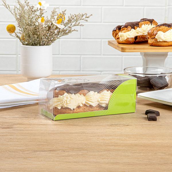 Restaurantware Sweet Vision Rectangle Clear Plastic Eclair Box - Green Paper Sleeve Geometric Line Accent - 7" X 2 1/2" X 2 1/2" - 100 Count Box