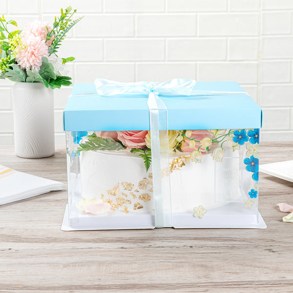 Restaurantware Sweet Vision Square Clear Plastic Cake Box - Blue Lid And White Base Blue Ribbon Flower Accent - 10" X 10" X 8 1/4" - 10 Count Box