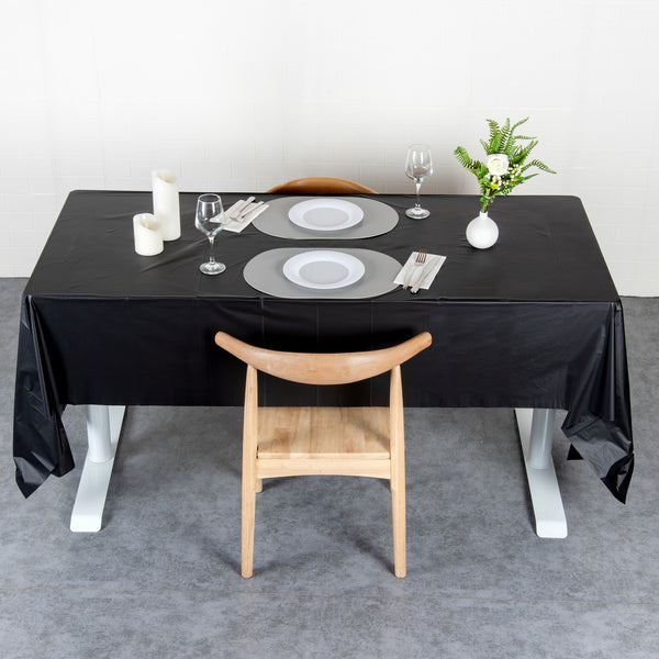 Restaurantware Table Tek Black Plastic Table Cover Roll - With Slide Cutter - 100' X 54" - 10 Count Box
