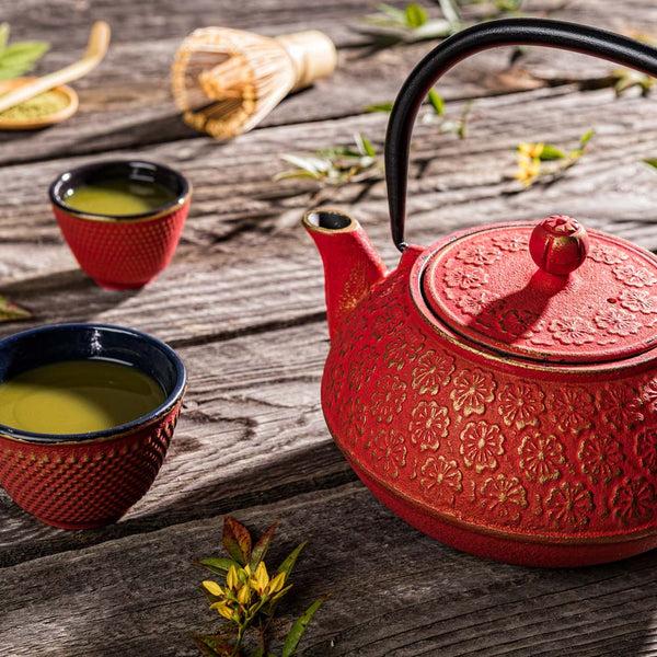 Restaurantware Tetsubin 30 Oz Red Cast Iron Teapot - Cherry Blossom - 7 1/2" X 6 1/2" X 4 1/2" - 1 Count Box