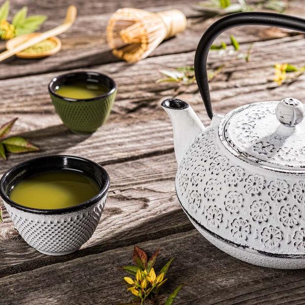 Restaurantware Tetsubin 30 Oz White Cast Iron Teapot - Cherry Blossom - 7 1/2" X 6 1/2" X 4 1/2" - 1 Count Box