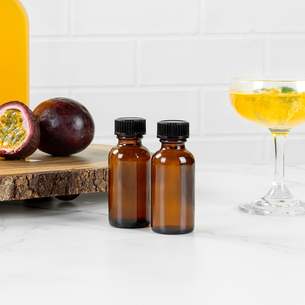 Restaurantware Vetri 1 Oz Boston Round Amber Glass Bottle - With Black Phenolic Cap - 1 1/4" X 1 1/4" X 3" - 48 Count Box