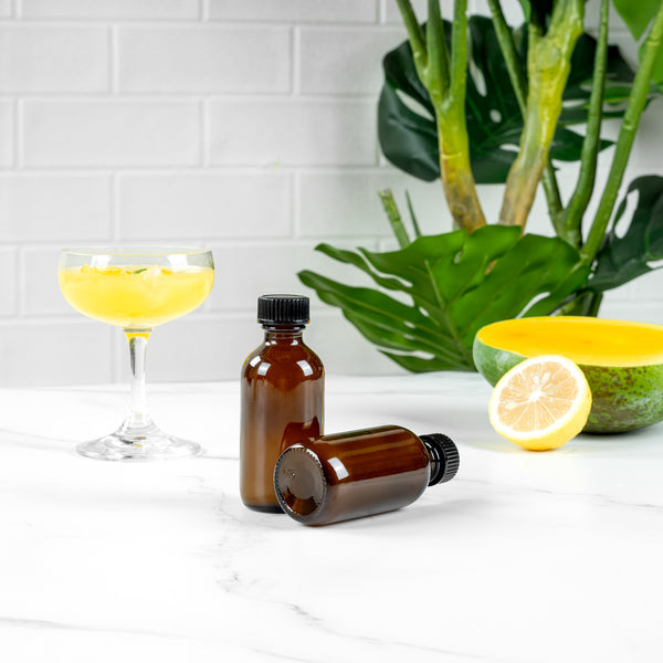 Restaurantware Vetri 2 Oz Boston Round Amber Glass Bottle - With Black Phenolic Cap - 1 1/2" X 1 1/2" X 3 3/4" - 48 Count Box