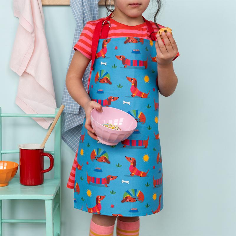 rex london Wipeable cotton children's apron - Sunny Sausage Dog