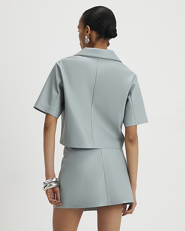 River Island Blue Faux Leather Eyelet Mini Wrap Skirt