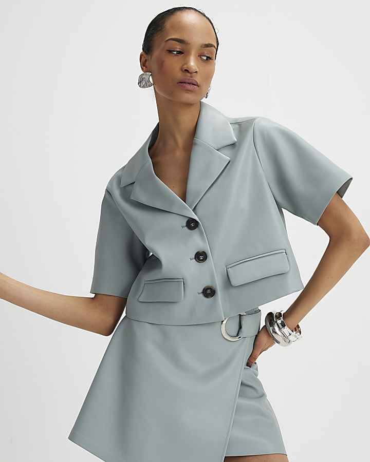 River Island Blue Faux Leather Eyelet Mini Wrap Skirt