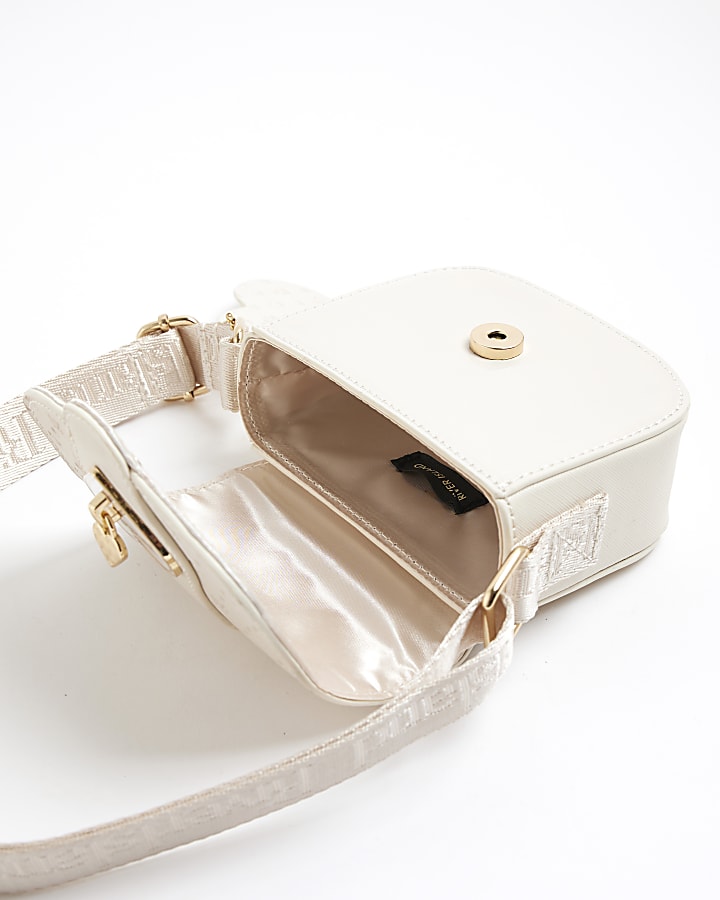 river island Girls Cream Monogram Heartlock Cross Body Bag