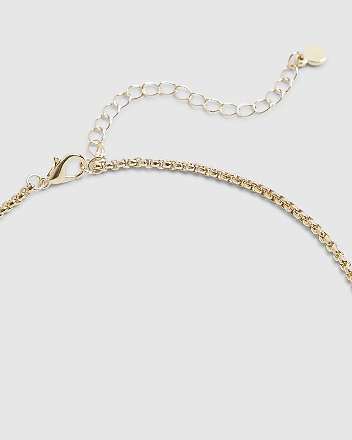 River Island Gold Spinner Necklace