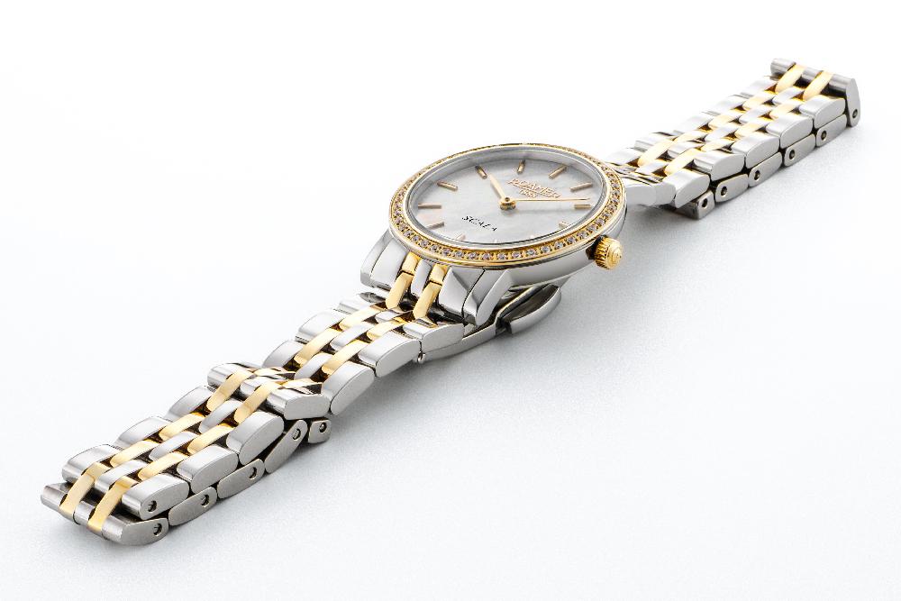 Roamer Scala 28 Mm Quartz Two-Hand White Mop Dial Silver-Gold Tone Bracelet Sapphire Glass Stainless Steel Swiss Watch