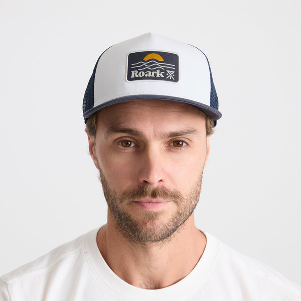 Roark Station Trucker Snapback Hat In White/Navy