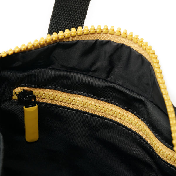 Roka London All Black Canfield Roll Top Backpack In Corn