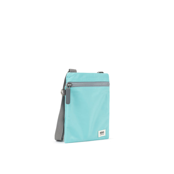 Roka London Chelsea Pocket Sling Bag In Aquatic Awe