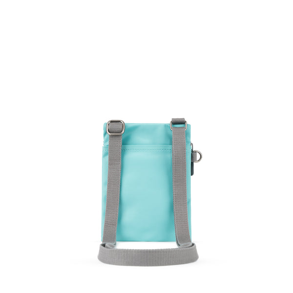 Roka London Chelsea Pocket Sling Bag In Aquatic Awe