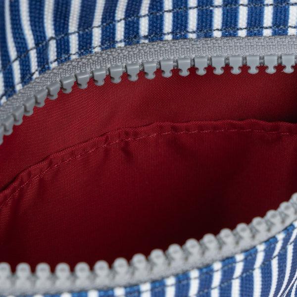 Roka London Chelsea Pocket Sling Bag In Blue Hickory