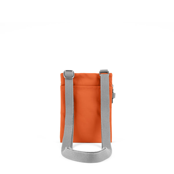 Roka London Chelsea Pocket Sling Bag In Burnt Orange