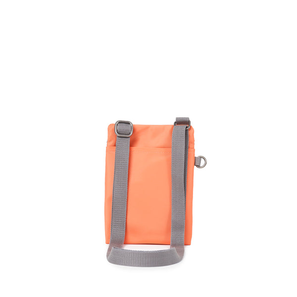 Roka London Chelsea Pocket Sling Bag In Firecracker
