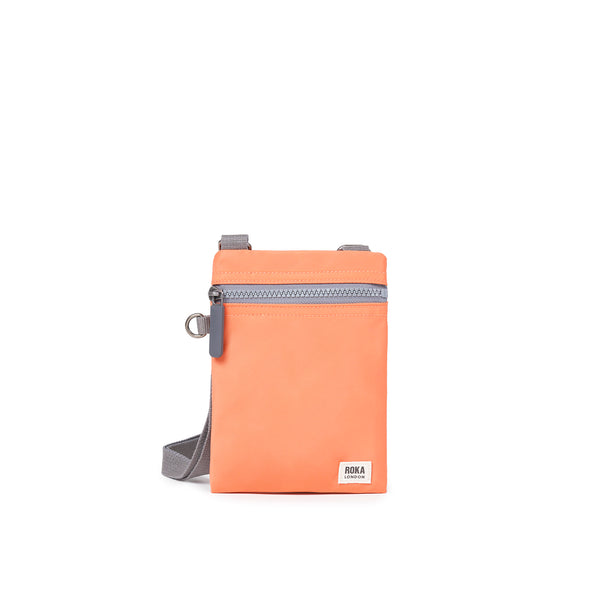 roka london Chelsea Pocket Sling Bag in Firecracker