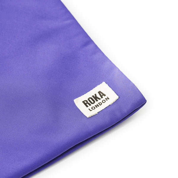 Roka London Chelsea Pocket Sling Bag In Simple Purple