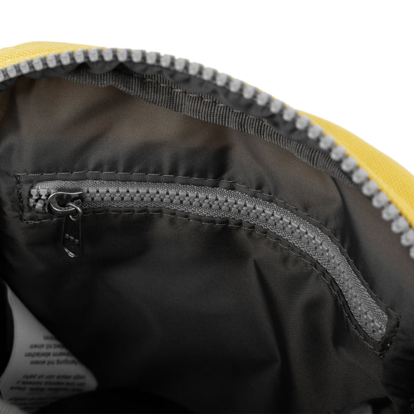 Roka London Bond Pocket Crossbody Bag In Lemonade