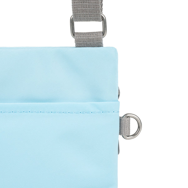 Roka London Chelsea Pocket Sling Bag In Canal