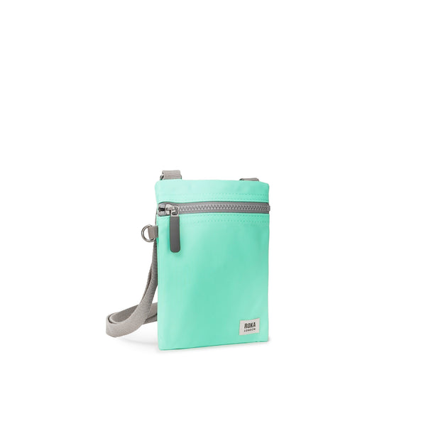 Roka London Chelsea Pocket Sling Bag In Capri