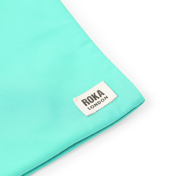 Roka London Chelsea Pocket Sling Bag In Capri
