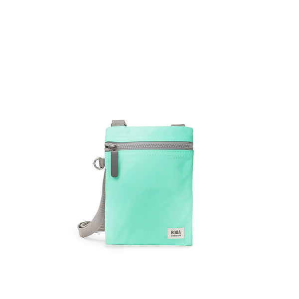 roka london Chelsea Pocket Sling Bag in Capri