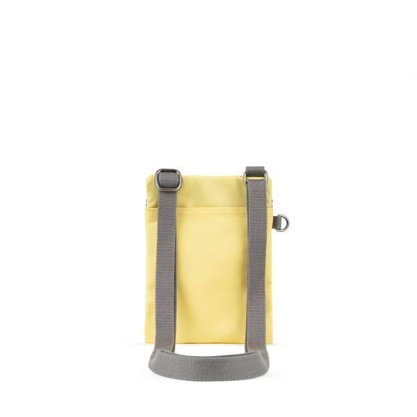 Roka London Chelsea Pocket Sling Bag In Citron